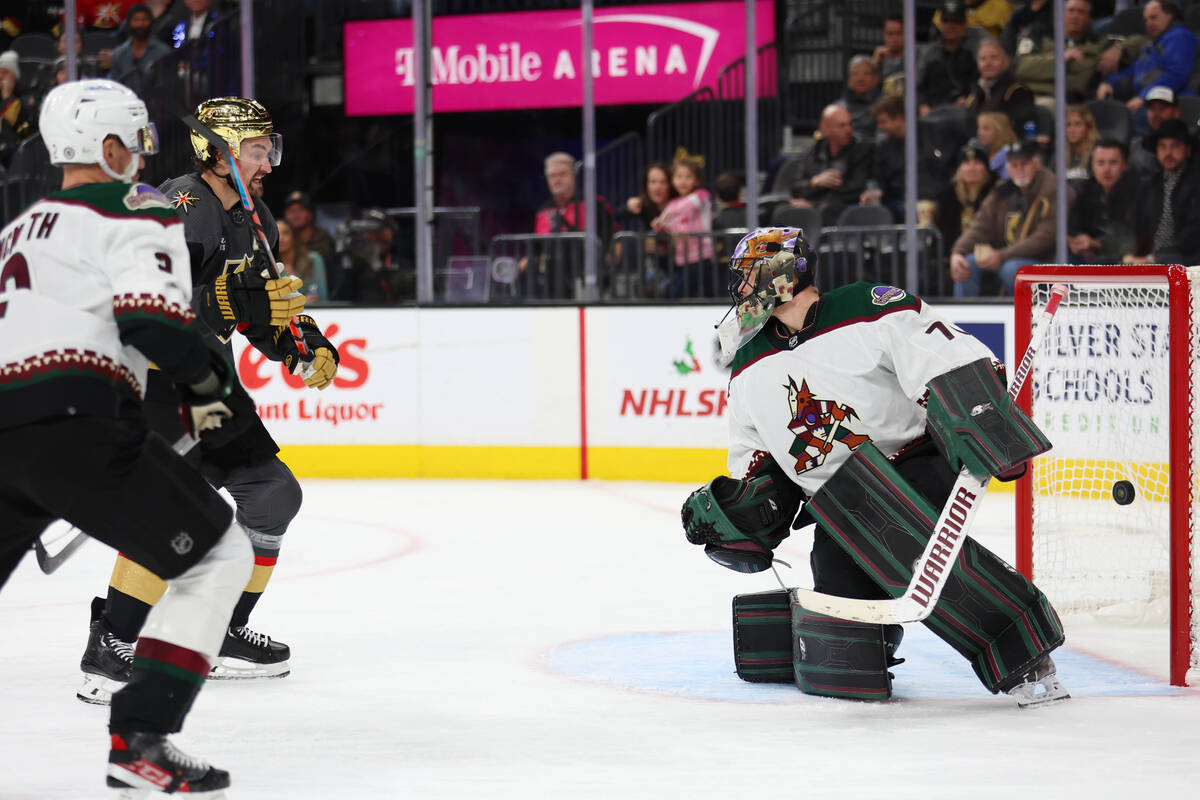 Vegas Golden Knights right wing Mark Stone (61) watches his shot go in for a score against Ariz ...