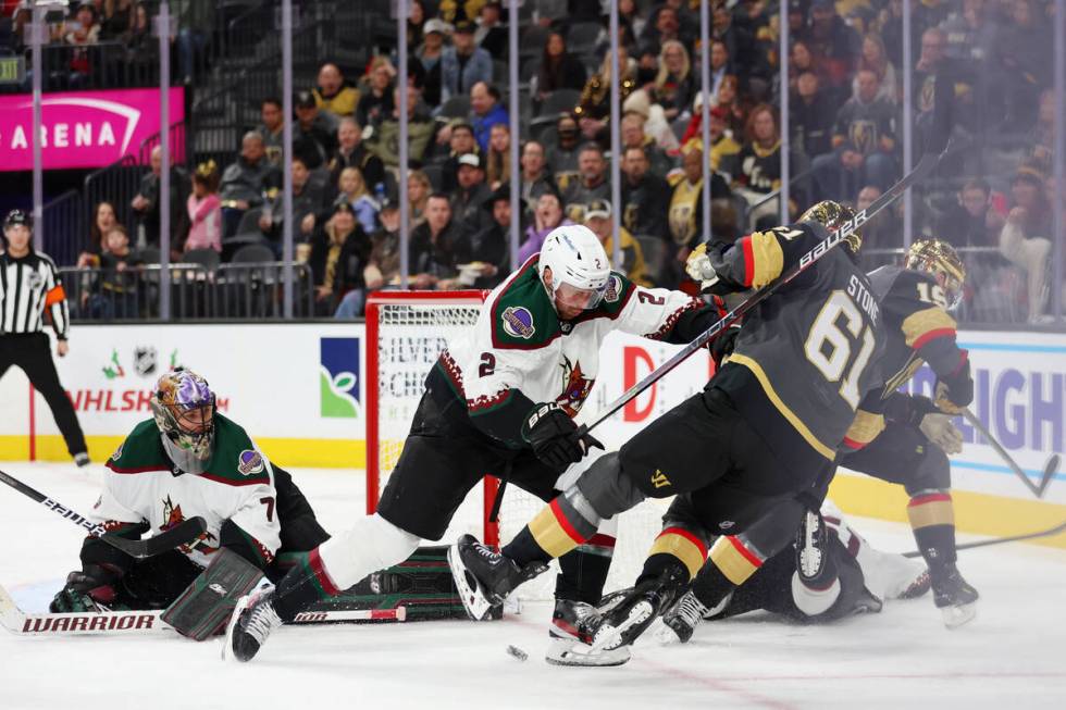 Arizona Coyotes defenseman Patrik Nemeth (2) defends against Vegas Golden Knights right wing Ma ...