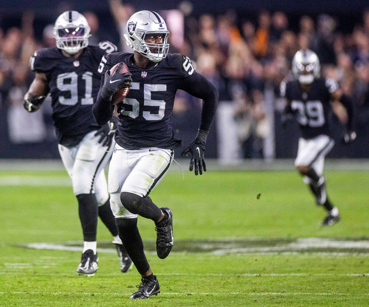 Raiders defensive end Chandler Jones (55) breaks away from a tackle attempt by New England Patr ...