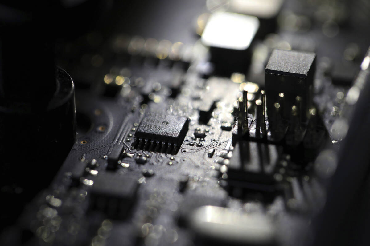 FILE - This Feb 23, 2019, file photo shows the inside of a computer. (AP Photo/Jenny Kane, File)