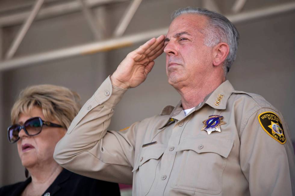 Clark County Sheriff Joe Lombardo salutes as the national anthem is sung during a Sept. 11 reme ...