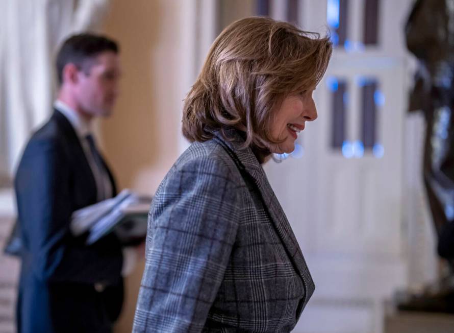 Speaker of the House Nancy Pelosi, D-Calif., leaves the chamber as the final votes of the 117th ...