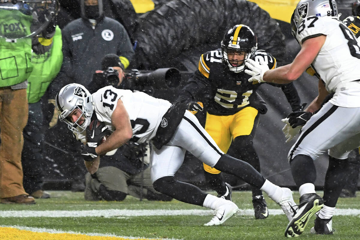 Las Vegas Raiders wide receiver Hunter Renfrow (13) dives for a touchdown with Pittsburgh Steel ...
