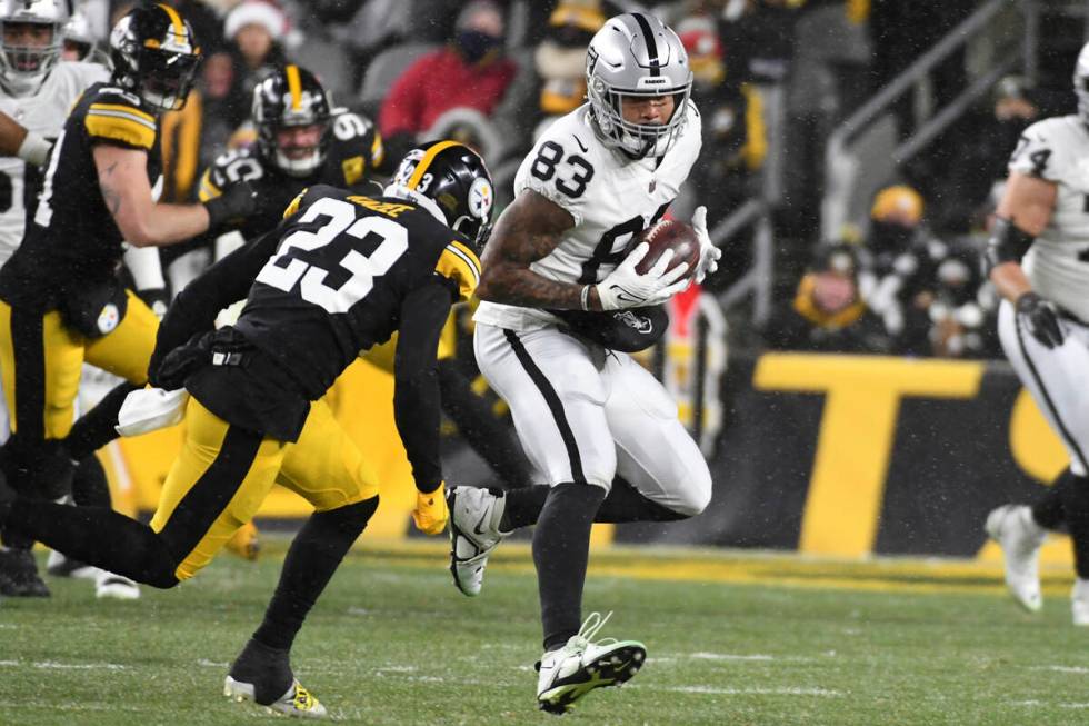 Las Vegas Raiders tight end Darren Waller (83) catches a pass with Pittsburgh Steelers safety D ...
