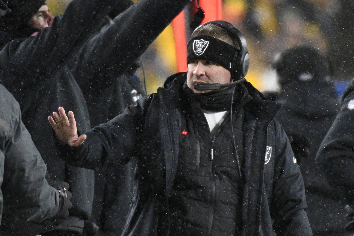 Las Vegas Raiders head coach Josh McDaniels gestures on the sideline during the first half of a ...