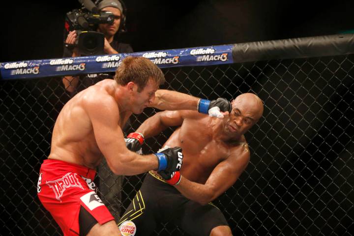 FILE - Anderson Silva, right, of Brazil, fights Stephan Bonnar, of the United States, during th ...