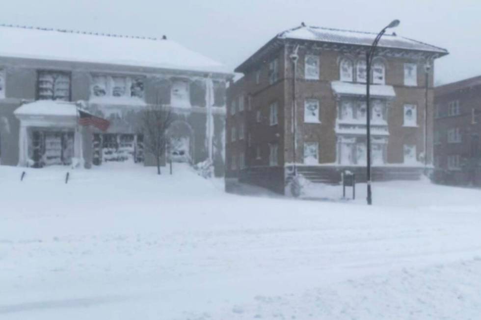 High winds and snow covers the streets and vehicles in Buffalo, N.Y. on Sunday, Dec. 25, 2022. ...