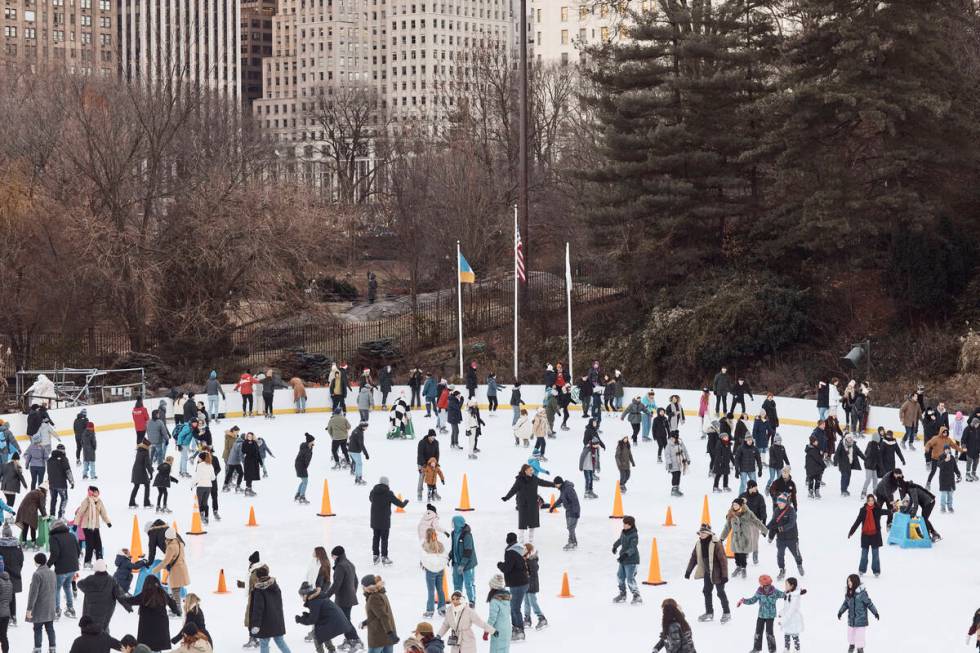 People ice skate on Christmas Day at Central Park on Sunday, Dec. 25, 2022, in New York. (AP Ph ...