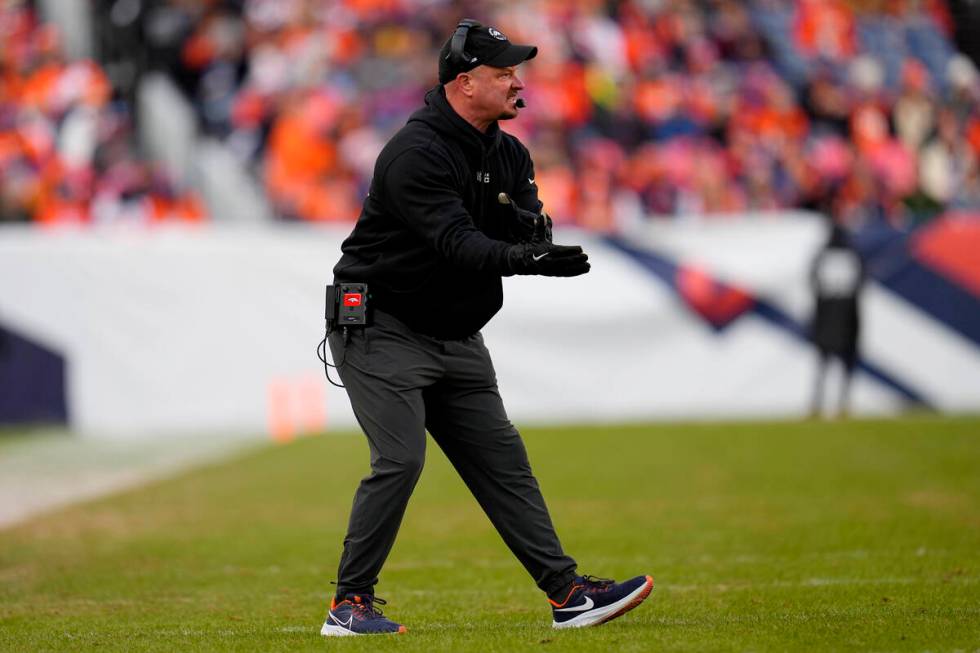 Denver Broncos head coach Nathaniel Hackett reacts after an interception against the Arizona Ca ...