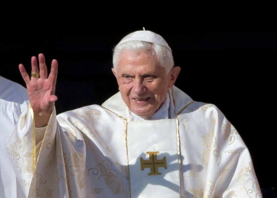 FILE - Pope Emeritus Benedict XVI arrives in St. Peter's Square at the Vatican to attend the be ...