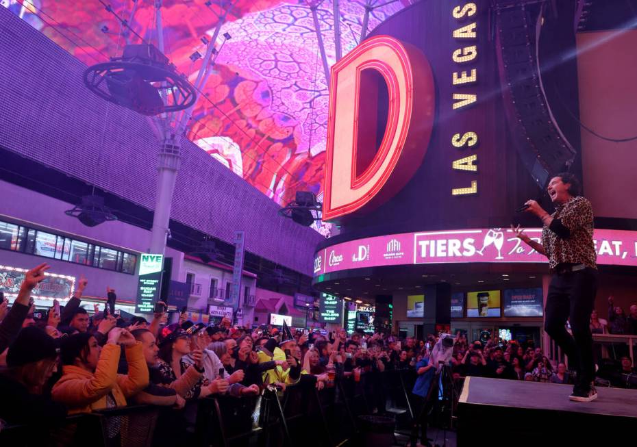 Gavin Rossdale performs with Bush for New Year’s Eve revelers on the Third Street State at th ...