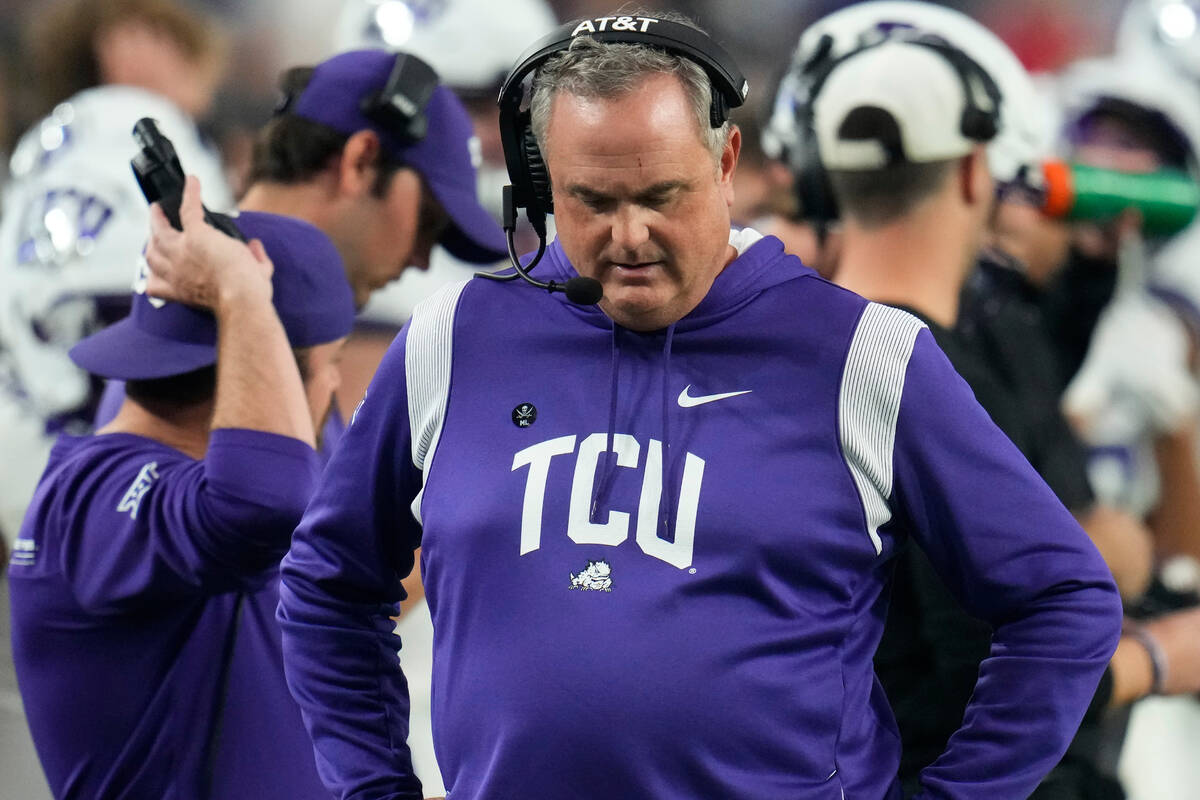 TCU head coach Sonny Dykes walks the sidelines during the second half of the Fiesta Bowl NCAA c ...