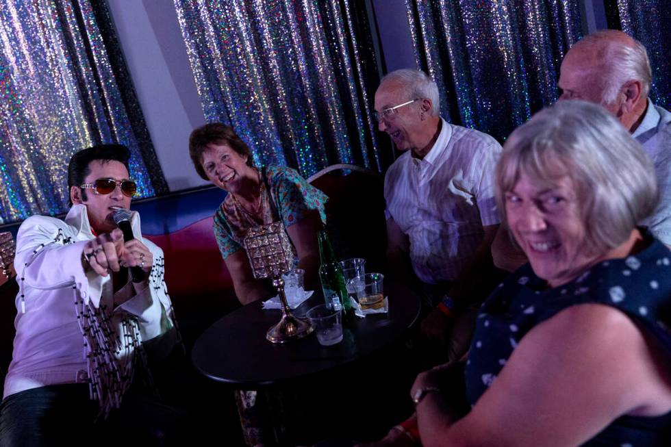 Vegas Elvis Tribute Artist Steve Connolly interacts with guests during his "Spirit Of The ...