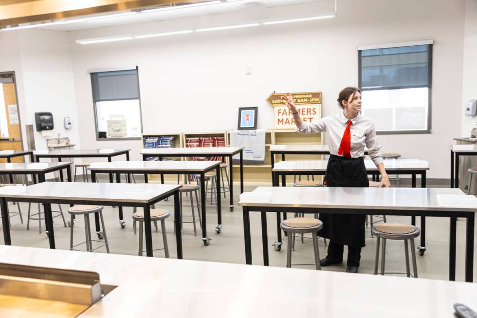 Southeast Career Technical Academy senior Katelon Bouteiller gives a tour of the kitchen and cl ...