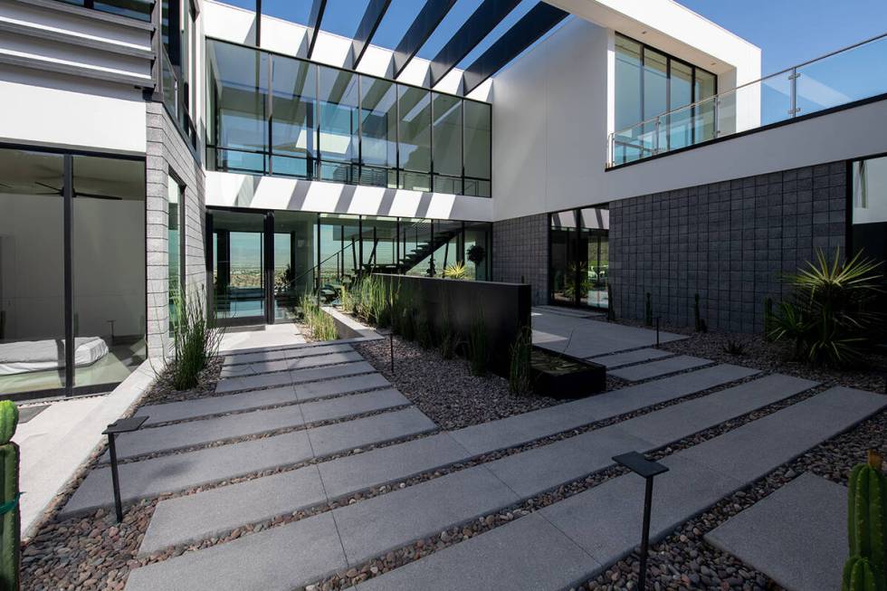 A two-story home on Boulderback Drive in Ascaya Henderson sold in June for $9.14 million. (Simp ...