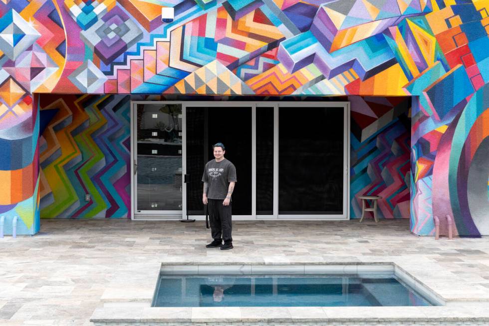 Brandon Bowsky, who had a large mural painted on two sides of his house, in front of the art pi ...