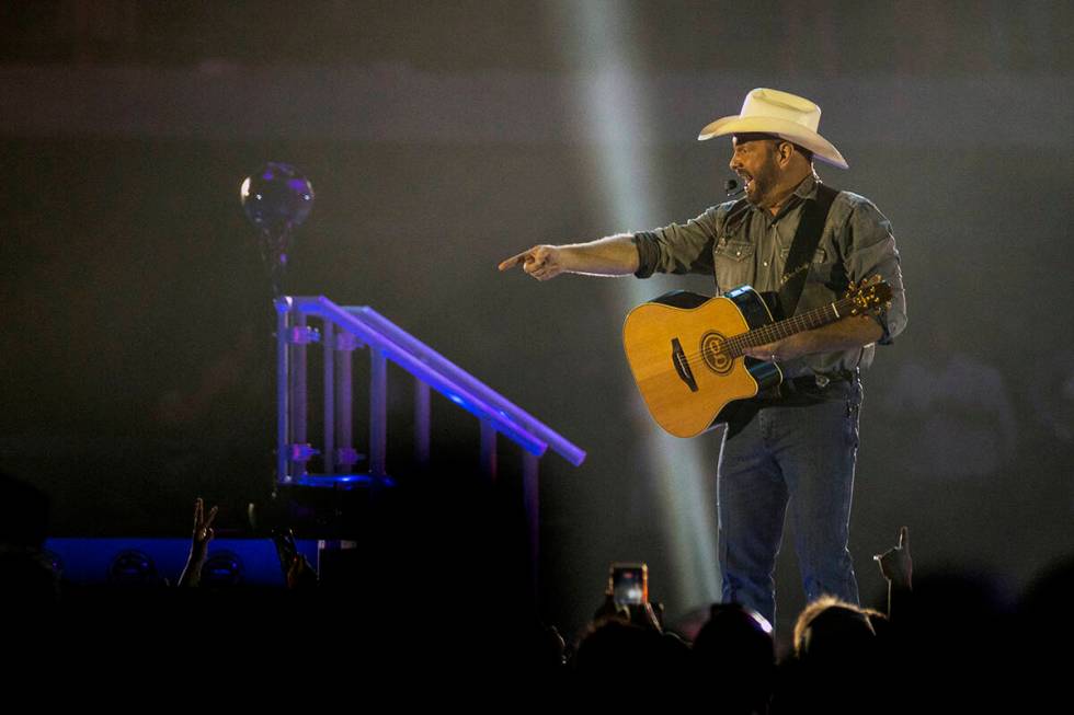 Garth Brooks performs before the crowd at Allegiant Stadium on Friday, July 10 2021, in Las Veg ...