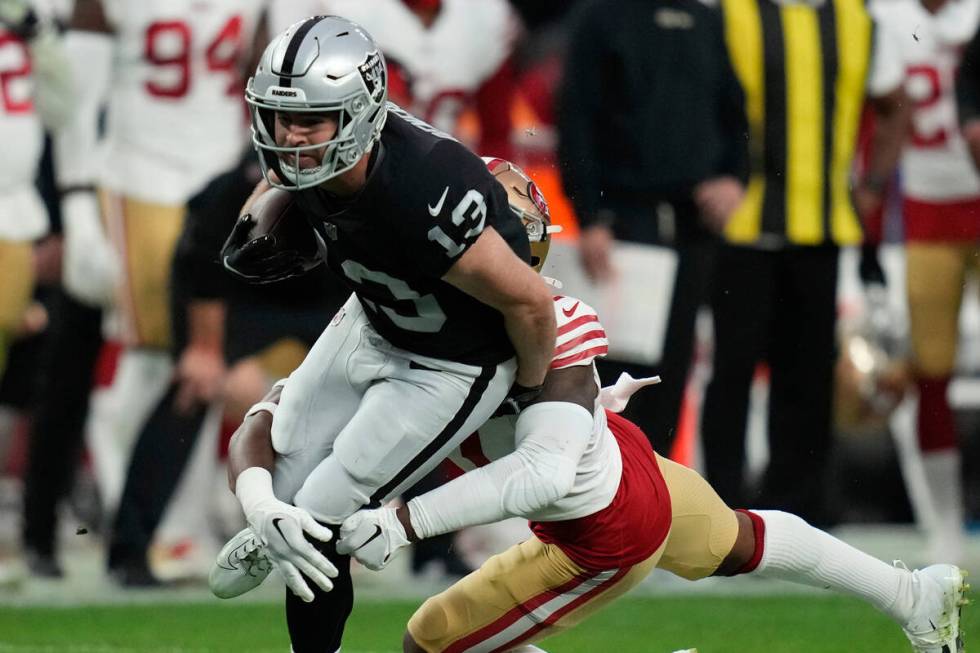 San Francisco 49ers cornerback Jimmie Ward (1) tackles Las Vegas Raiders wide receiver Hunter R ...