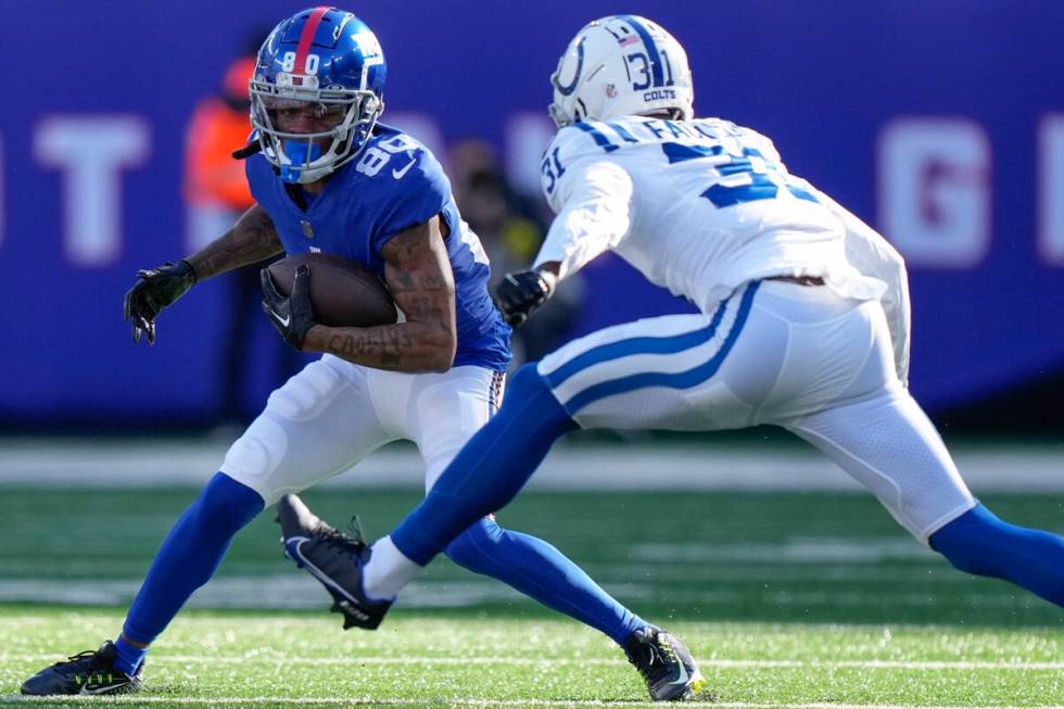 Indianapolis Colts' Brandon Facyson (31) closes in on New York Giants' Richie James (80) during ...