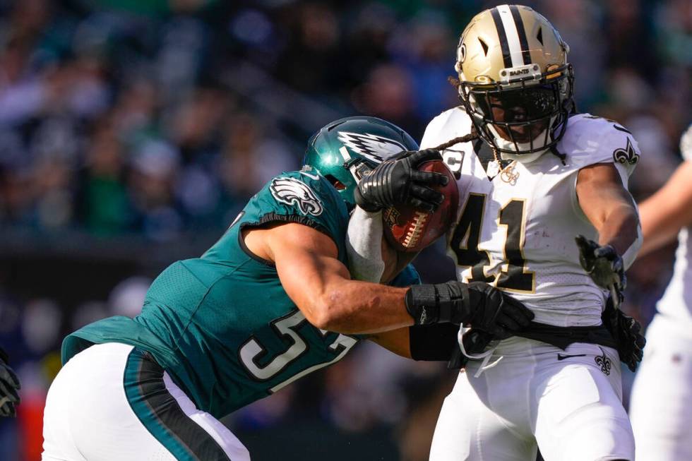 New Orleans Saints running back Alvin Kamara (41) is tackled by Philadelphia Eagles linebacker ...