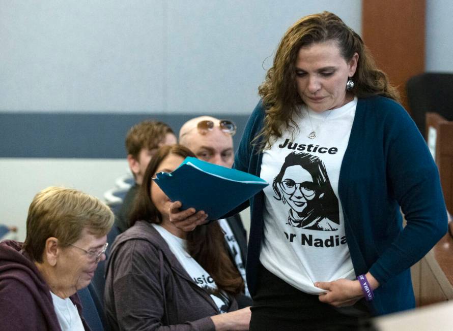 Marie Coker, the sister of Nadia Iverson, a shooting victim, prepares to deliver her victim imp ...