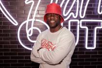 Kevin Hart poses for a portrait at the opening of his new vegan fast-food restaurant "Hart Hous ...