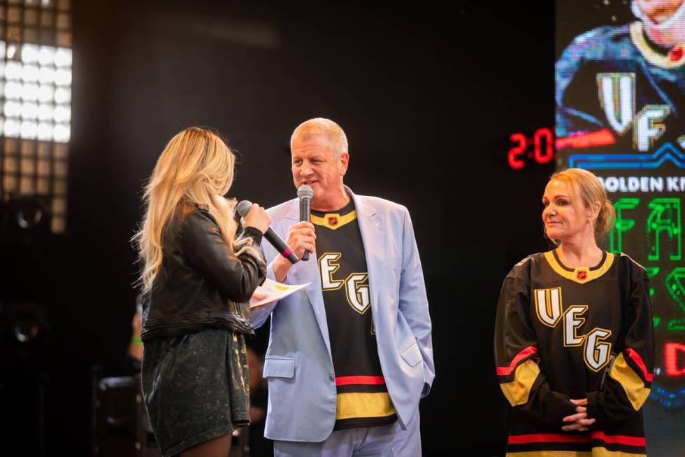 Derek Stevens, center, owner of the D Las Vegas hotel-casino, provides opening remarks as his w ...