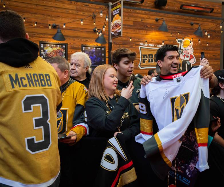 Fans get excited as the Las Vegas Golden Knights’ Brayden McNabb signs autographs during ...