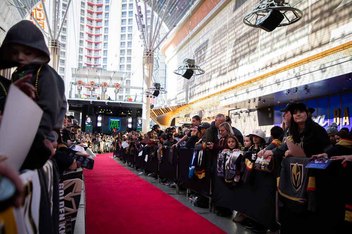 Fans during the Las Vegas Golden Knights Fan Fest at the Fremont Street Experience Main St. sta ...