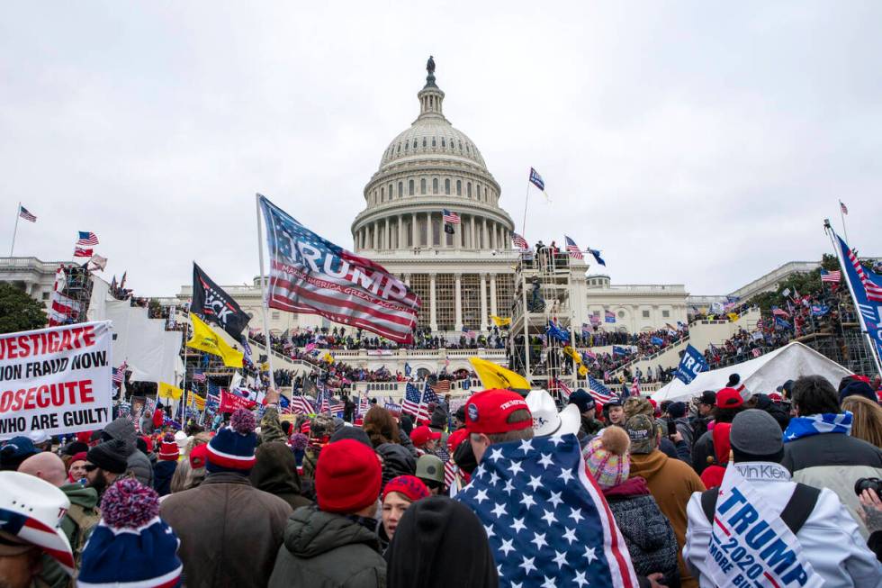 Rioters loyal to President Donald Trump rally at the U.S. Capitol in Washington on Jan. 6, 2021 ...