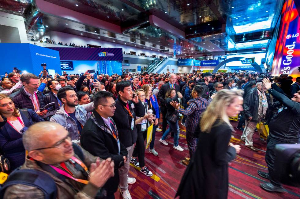 Attendees enter central hall during the opening day of CES 2023 at the Las Vegas Convention Cen ...