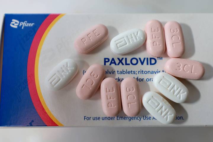 In this photo illustration, Pfizer's Paxlovid is displayed on July 7, 2022, in Pembroke Pines, ...