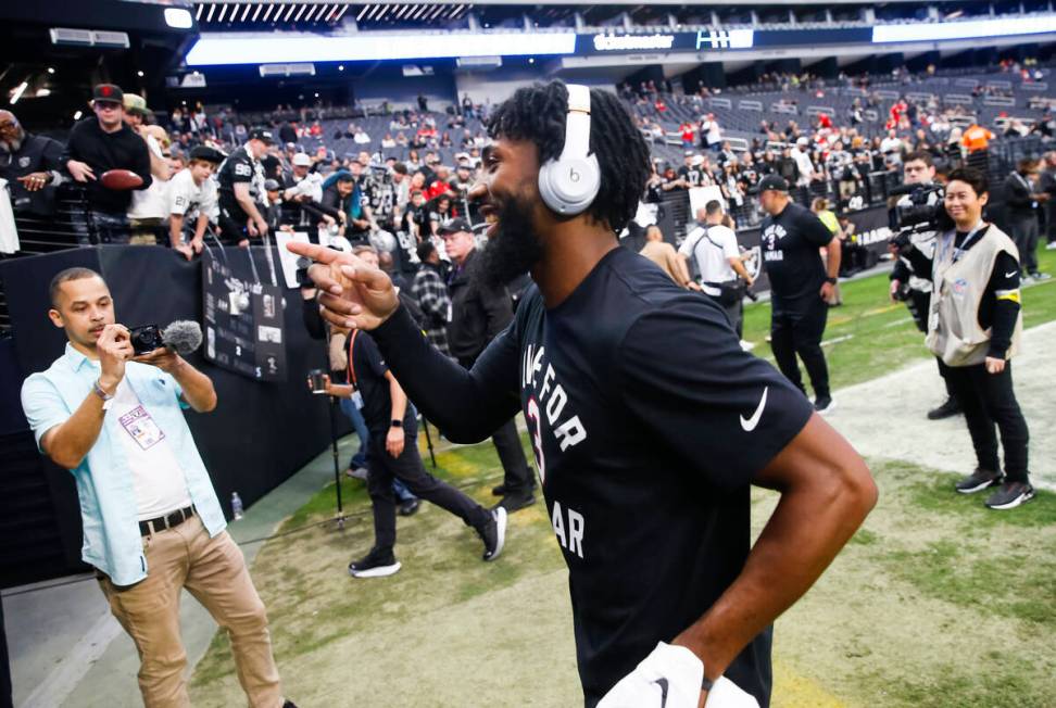 Raiders cornerback Nate Hobbs comes off the field after warming up before an NFL game at Allegi ...