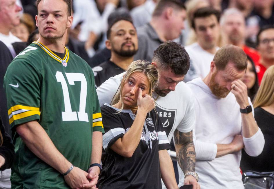 Fans become emotions as they show their support for injured player Damar Hamlin as the Raiders ...