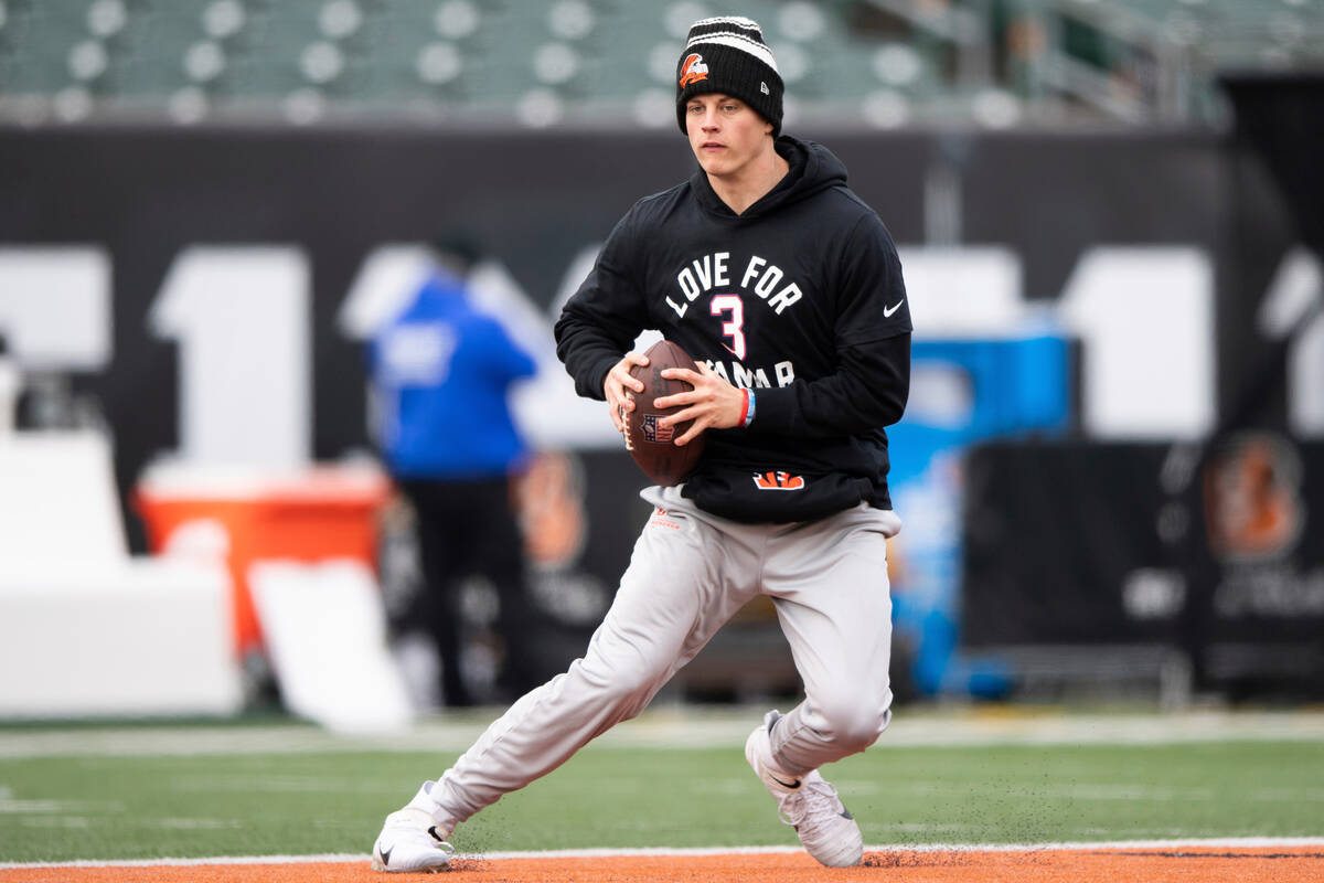 Cincinnati Bengals quarterback Joe Burrow (9) warms up in a shirt in support of Buffalo Bills s ...