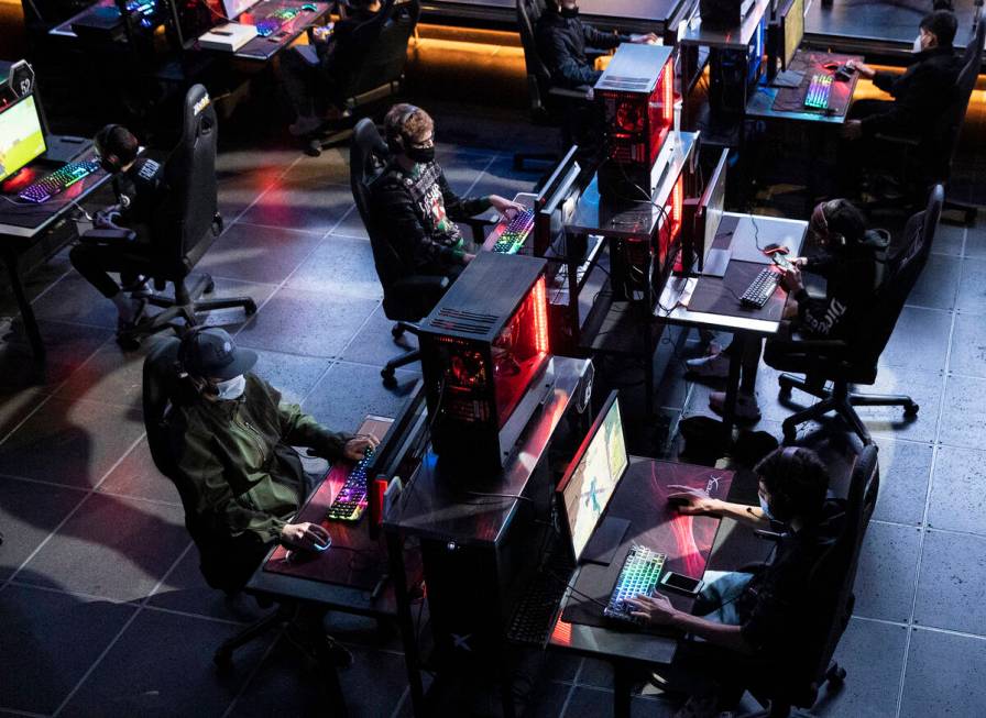 Players compete during the Fortnite tournament "Friday Night Frags"at the HyperX Espo ...