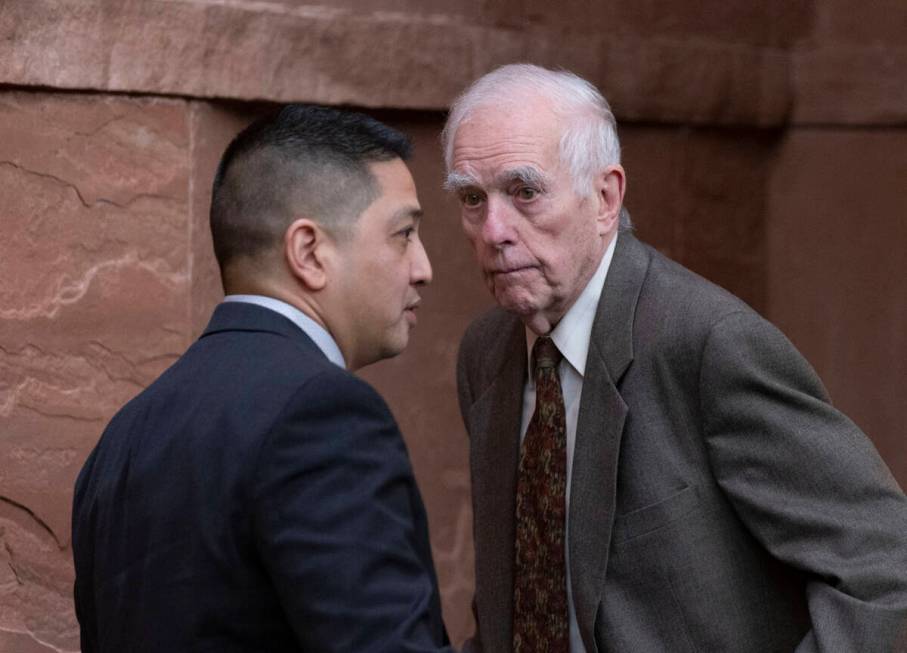 Las Vegas Metro Police Department Detective Scott Mendoza, left, and Hearing Officer William Ja ...