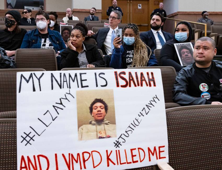 Latia Alexander, front left, the mother of Isaiah Williams, Desiree Smith, and Kianna Grant, ri ...