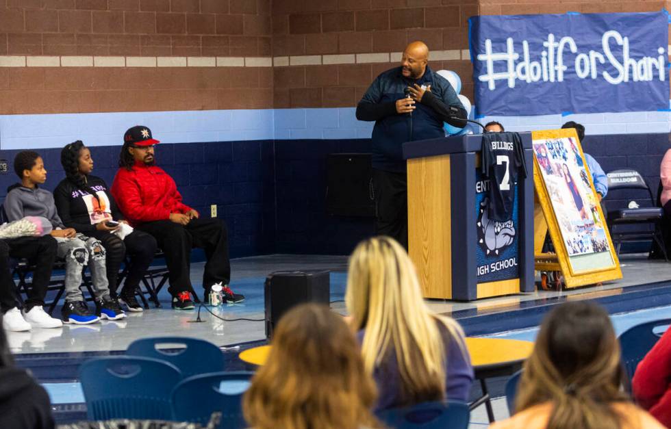 Centennial flag football coach Stan Standifer, right, addresses the family of Ashari Hughes dur ...