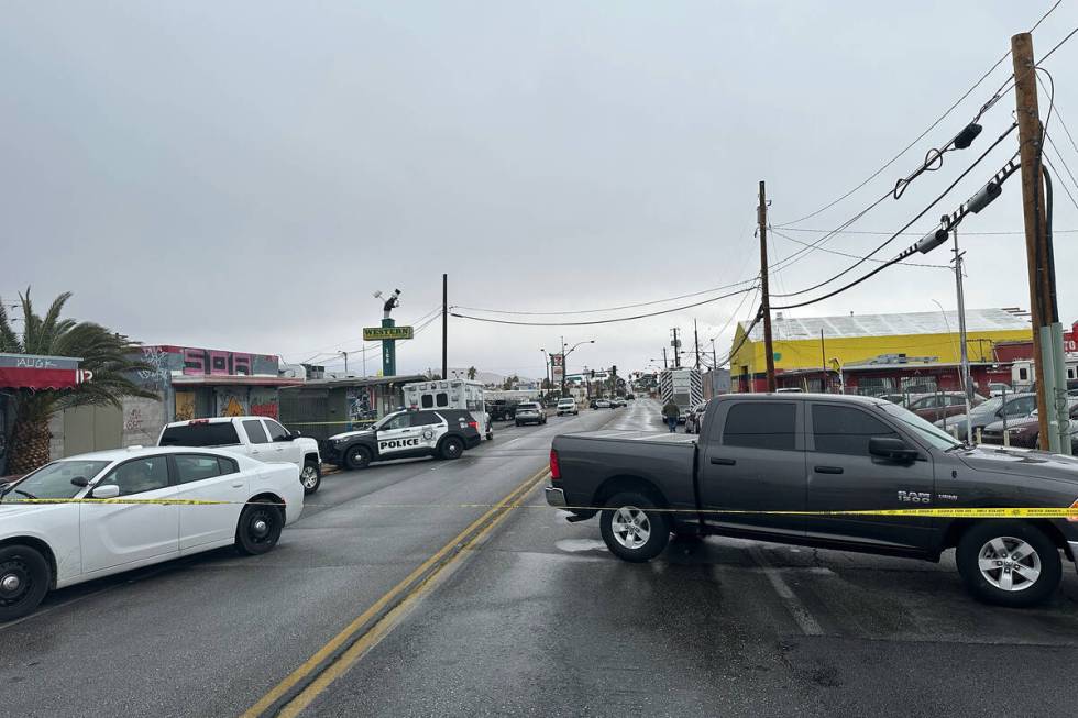 Police investigate a fatal shooting Tuesday, Jan. 10, 2023, at a tow business on the 100 block ...