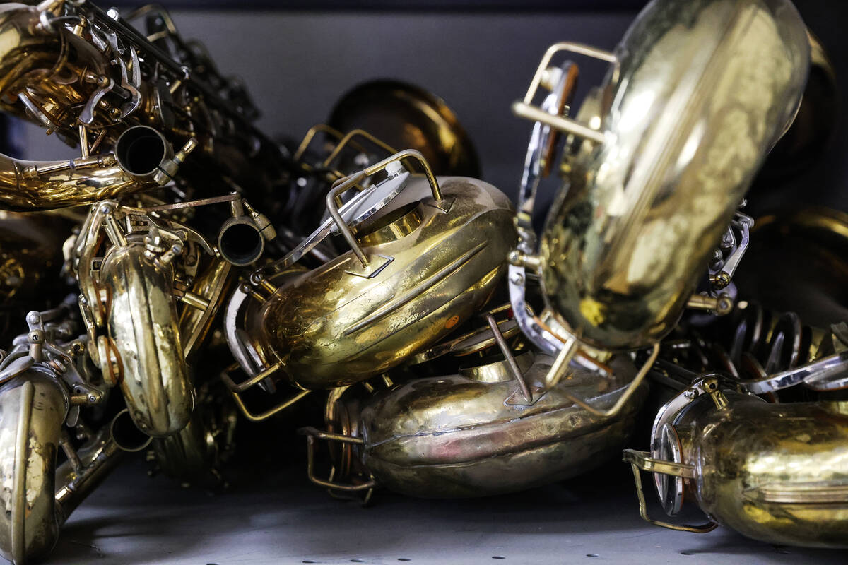 Saxophones in the storage room at the Clark County School District repair shop for musical inst ...