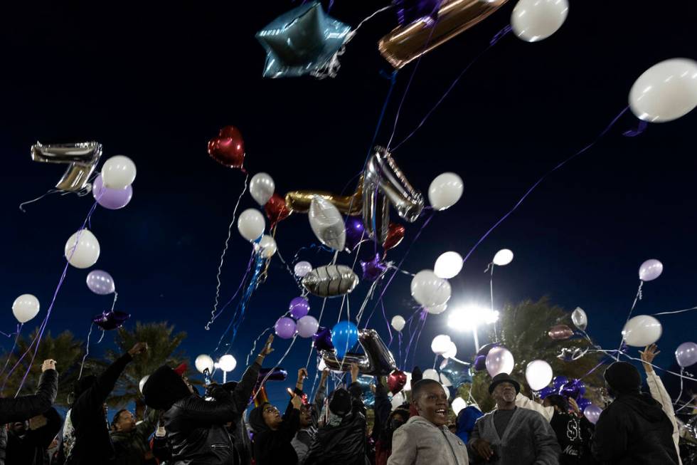 Loved ones of Ashari Hughes release balloons in her honor outside Doolittle Community Center on ...