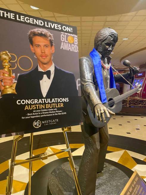 A congratulatory sign next to the famous bronze statue of Elvis Presley is shown at Westgate La ...