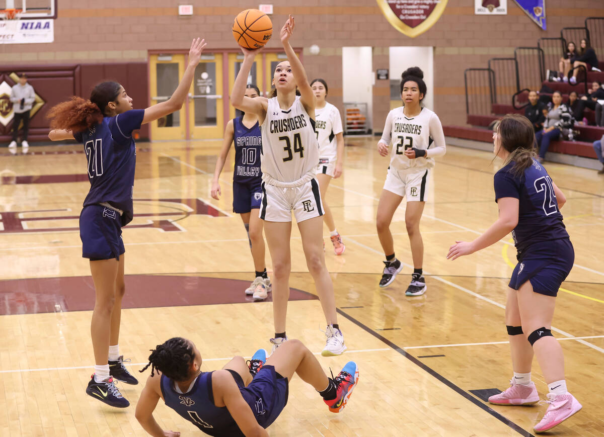 Faith Lutheran's Leah Mitchell (34) shoots against Spring Valley during the second half of a ba ...