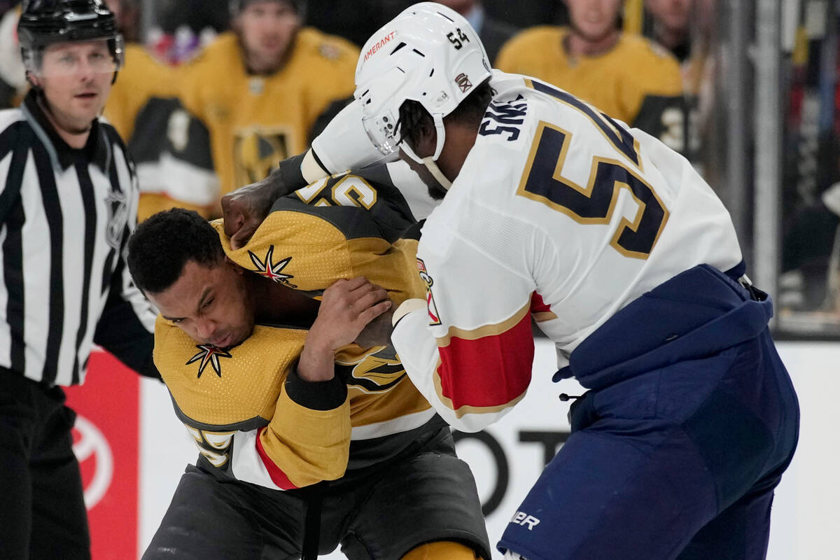 Florida Panthers right wing Givani Smith (54) and Vegas Golden Knights right wing Keegan Kolesa ...