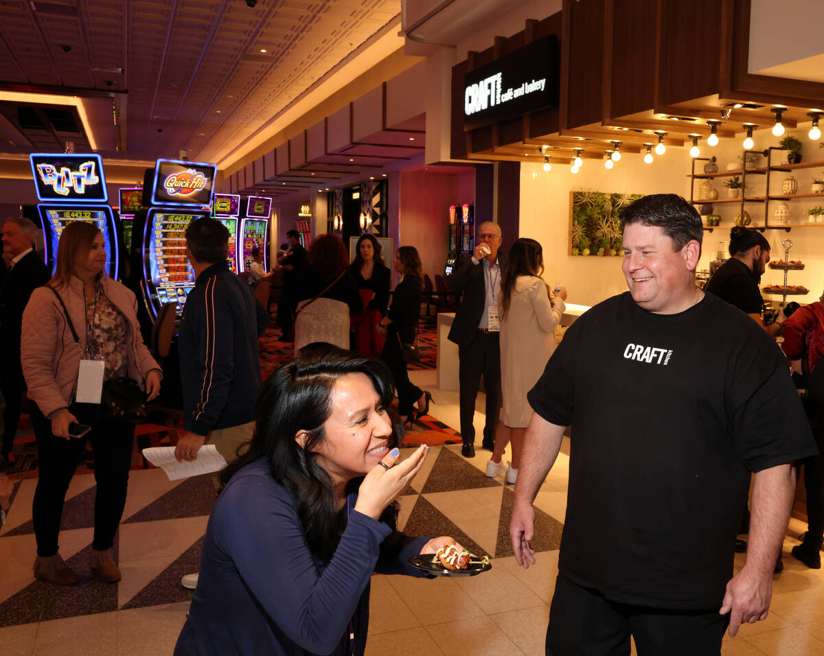 CRAFTkitchen Chef/owner Jaret Blinn mingles with Karen Gomez, Nevada Contractors Association di ...