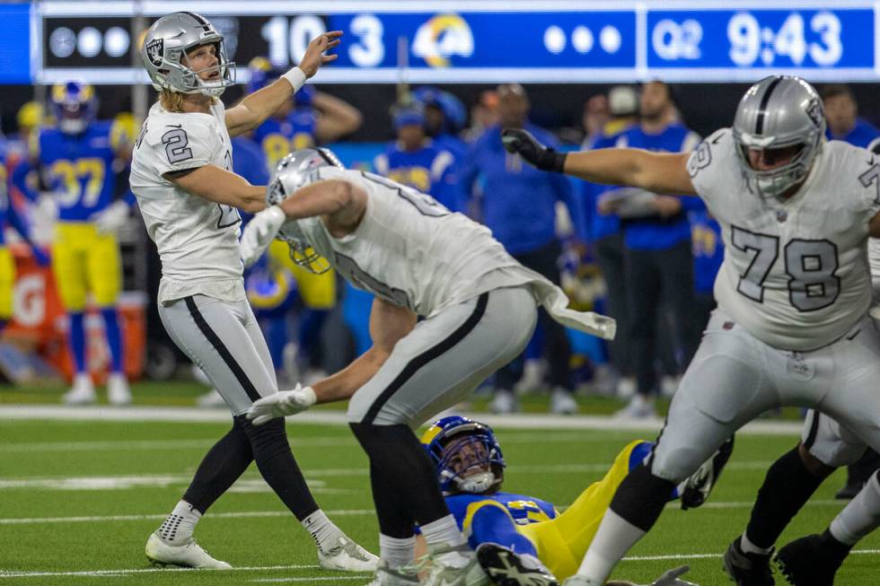 Raiders place kicker Daniel Carlson (2) kicks a field goal against the Los Angeles Rams during ...