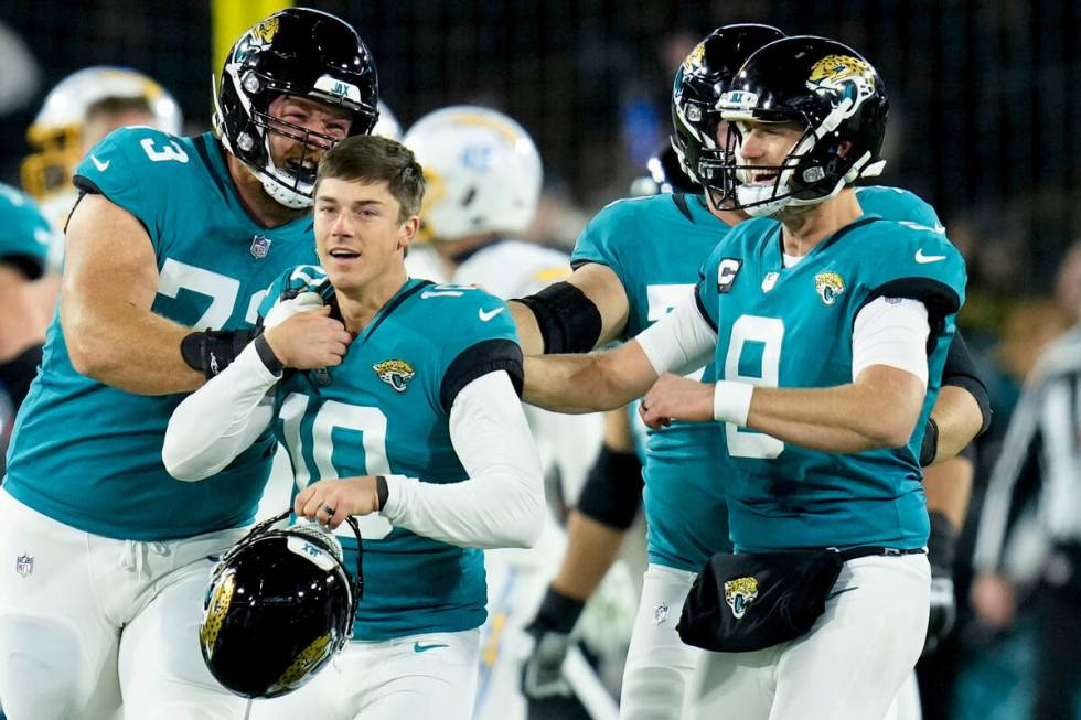 Jacksonville Jaguars place kicker Riley Patterson (10) and his team celebrate his game-winning ...