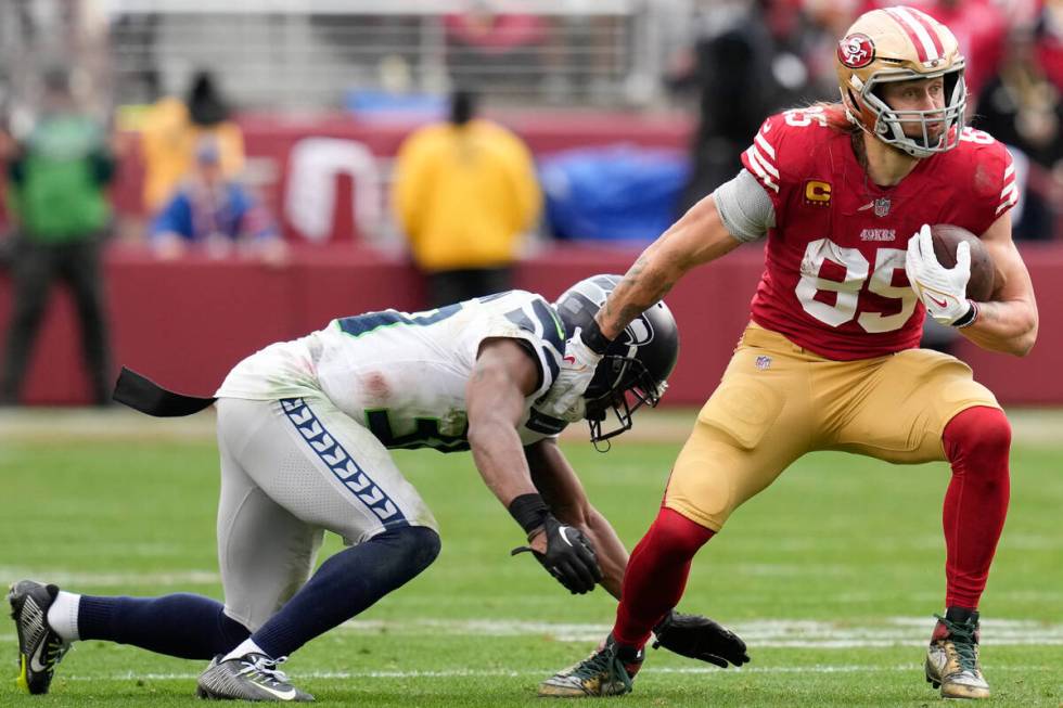 San Francisco 49ers tight end George Kittle (85) runs against Seattle Seahawks cornerback Mike ...