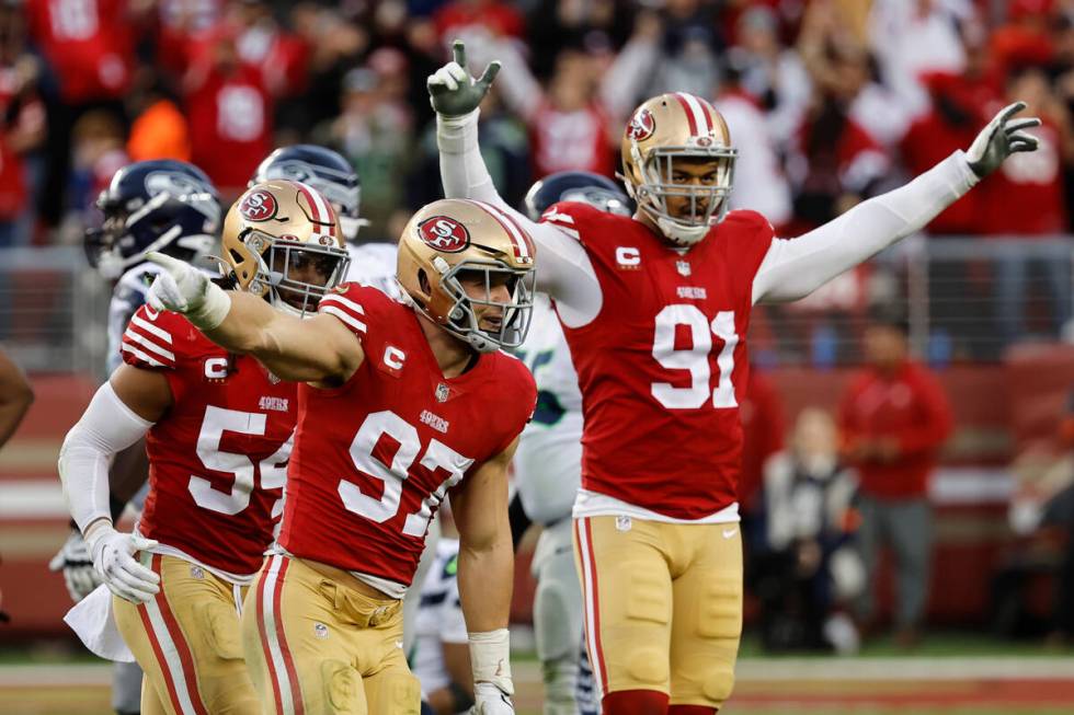 San Francisco 49ers defensive end Nick Bosa (97) celebrates after recovering a fumble during th ...